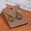 White Leaf Linked Hoop Earring In Leopard & Gold (LEQ54L)