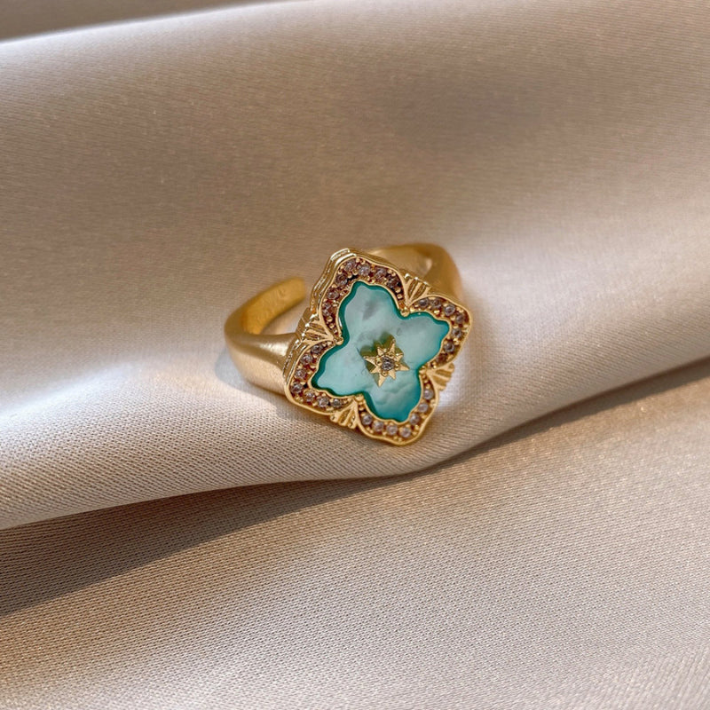 White Leaf Ornate Diamond Shaped Ring In Ice Blue (RNN287B)