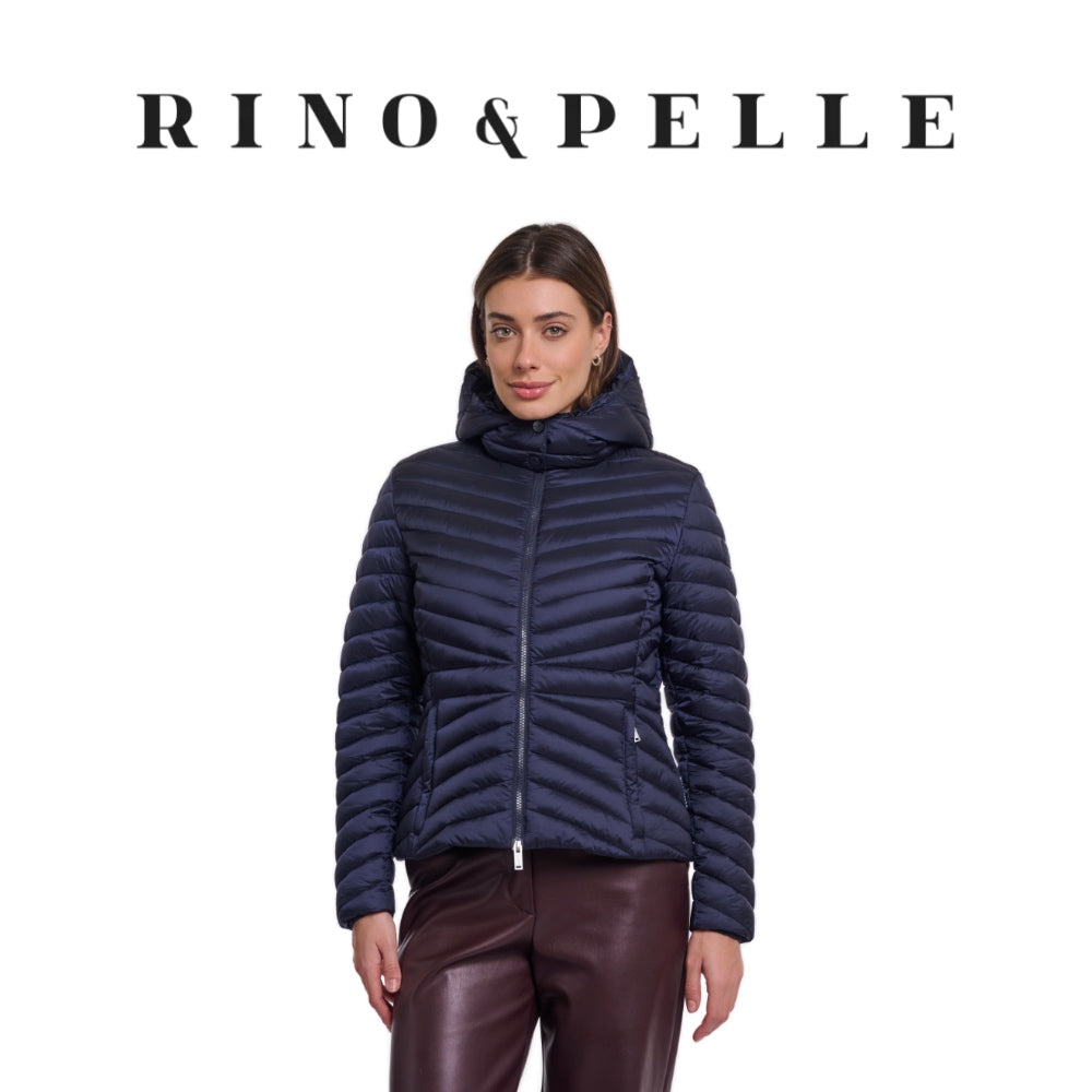 woman wearing a blue jacket by rino & pelle