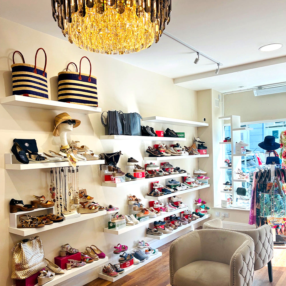 Image of the inside of the Tania Dolores store in Ramsey, showing shoes, handbags and accessories