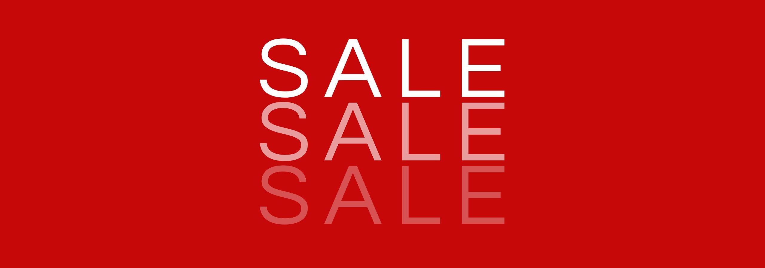 Sale written three times on a red background