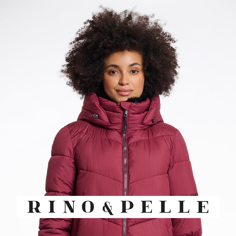 Image of a woman wearing a red Rino & Pelle coat